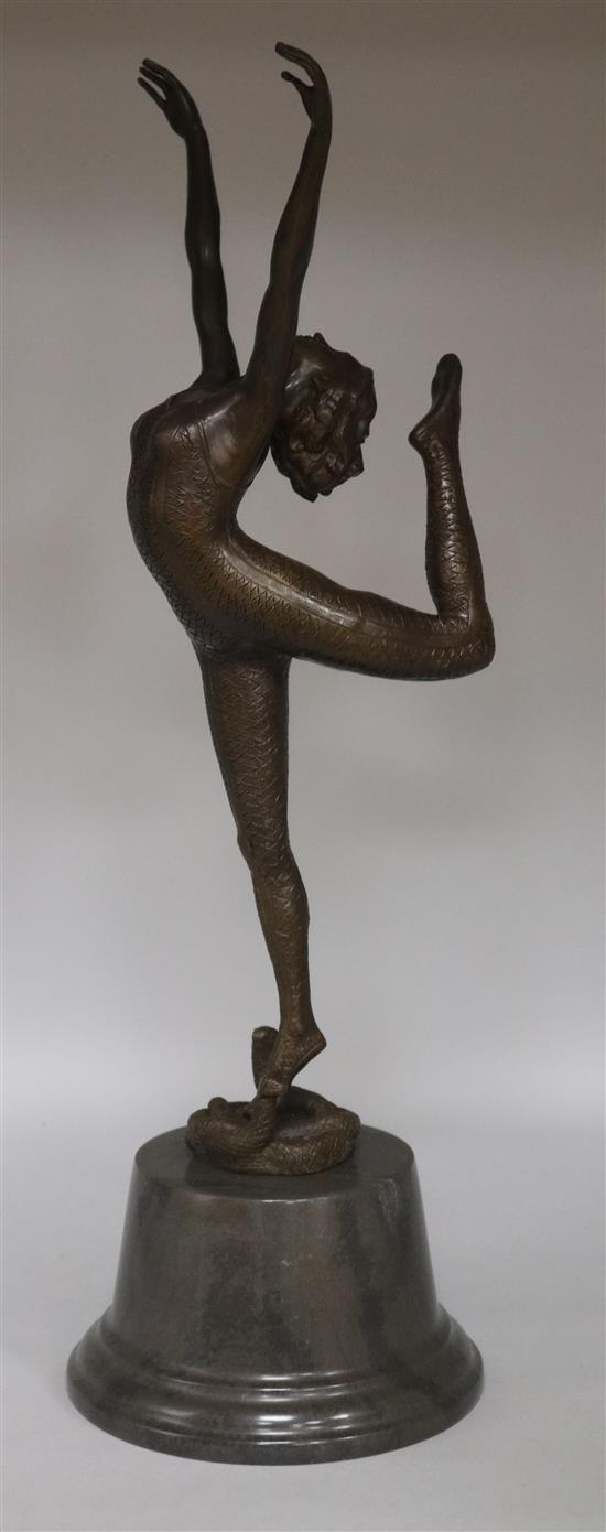 A bronze sculpture figure of a dancer